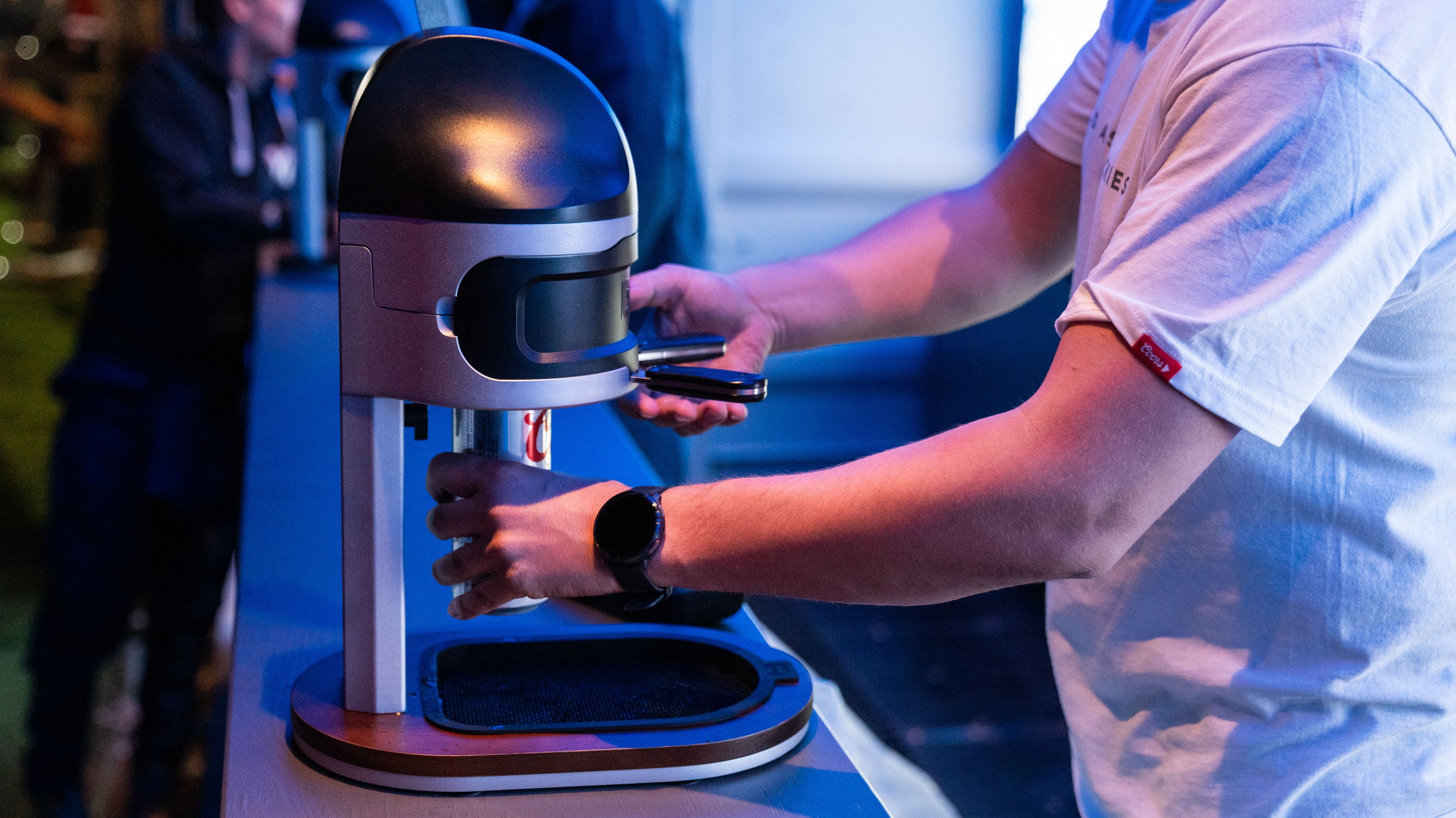 Person using DT Pro at a bar